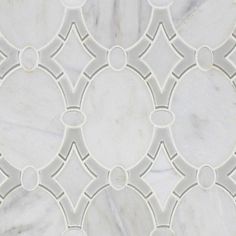 a white marble tile with circles on it