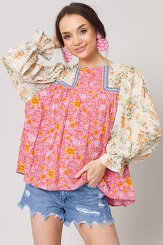 Long Sleeve Patterned Top With Mixed Print, Patterned Long Sleeve Top With Mixed Print, Pink Patchwork Blouse For Spring, Long Sleeve Blouse With Floral Patchwork For Spring, Spring Pink Patchwork Blouse, Spring Long Sleeve Blouse With Floral Patchwork, Pink Long Sleeve Tops With Floral Patchwork, Spring Patterned Tops With Patchwork, Flowy Bohemian Embroidered Top For Spring