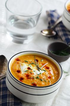 there is a bowl of soup on the table