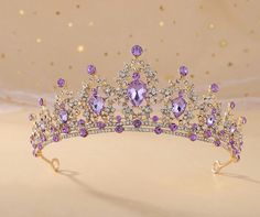 Material: Zinc Alloy, Rhinestone, Purple Crystal. Size: Approx 5.5" in diameter, 2.1" in height. Weight is 185g /0.4 lb. The size is suitable for most people's head. This romantic rhinestone tiara will look beautiful with any hair style. makes you standout in wedding, proms, parties or any other special soiree. Beautiful gold-plated rhinestone crown is encrusted with sparkling rhinestones and perfect for a wedding day princess. The perfect design makes this crown more elegant and suitable for the ladies and girls in any occasions, such as Wedding, Birthday, Engagements, Proms, Parties, Pageants, Valentine's Day, Anniversary or any occasion you want to be more charming. FAST and FREE SHIPPING Quinceanera Crown, Purple Crown, 15 Birthday, Crystal Bridal Tiaras, Bridal Headwear, Rhinestone Tiara, It Girls, Bridal Hair Jewelry, Hair Jewelry Wedding