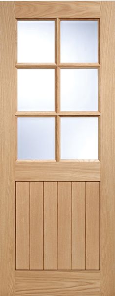 a wooden door with three panes on the side and one window in the middle