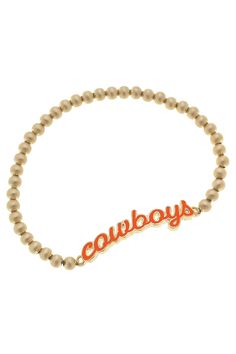 Cheer on your school with this versatile Oklahoma State Cowboys Enamel Script Stretch Bracelet in Orange & Satin Gold! Perfect for game day, it can be stacked with other bracelets or worn alone. Show your team spirit with "cowboys" pride (and style)! Oklahoma State Cowboys, Orange Satin, Oklahoma State, Team Spirit, Stretch Bracelet, Stretch Bracelets, Game Day, Oklahoma, Satin