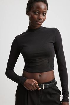 Cropped Mesh Detail Long Sleeve Top Black | NA-KD Black Cropped Mesh Top With Mesh Sleeves, Black Stretch Crop Top With Mesh Sleeves, Black Mesh Sleeves Crop Top For Spring, Black Stretch High Neck Crop Top, Stretch Cropped Mesh Top For Night Out, Black Turtleneck Mesh Top For Spring, Black Turtleneck Mesh Top For Night Out, Black Long Sleeve Mock Neck Top For Layering, Black Mock Neck Top With Long Sleeves For Layering