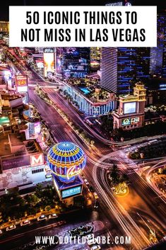 an aerial view of the las vegas strip at night with lights and buildings in the background