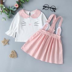 Baby Girls Cute Lapel Cat Print Tops & Suspender Skirt - PrettyKid Pink Cotton Kawaii Skirt, Cute Cotton Skirt, Cute Skirt For Spring Playtime, Cute Spring Skirt For Playtime, Cute Spring Playtime Skirt, Cute School Sets For Spring, Cute Spring School Sets, Playful School Sets For Spring, Cute Fitted School Set