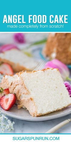 a slice of angel food cake on a plate with strawberries