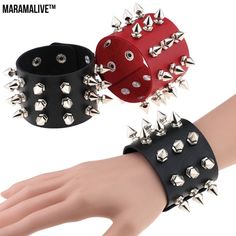 Name: Pointed Rivet Punk Bracelet Type: bracelets, bracelets Style: Unisex Material: PU leather, stainless steel snaps, CCB spikes Dimensions: length 22.5cm, width 5cm, product weight 30g. Leather Wristband, Leather Bangle, Gothic Rock, Wide Bracelet, Estilo Punk, Rock Punk, Wide Cuff, Leather Bracelets, Unisex Jewelry