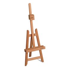 a wooden easel sitting on top of a white surface