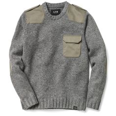 a gray sweater with two pockets on the chest and one pocket at the back,