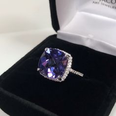 Beautiful Alexandrite & White Sapphire Ring  * 8ct Cushion Cut Alexandrite measures 12mm * White Sapphire Accents * Solid 925 Sterling Silver with an Anti-Tarnish Rhodium Finish * Sized to Order - Select Your Size Hallmarked & Gift Ready! Matching Earrings available here https://www.etsy.com/listing/454248468/gorgeous-10ct-cushion-cut-color-change?ref=shop_home_feat_2 Matching Pendant also Available! This Alexandrite is Laboratory Grown.  The color changes in this stone range from deep purple to Fine Jewelry Cushion Cut Gemstone With Center Stone, Cushion Cut Gemstones With Prong Setting, Elegant Cushion Cut Gemstones With Prong Setting, Elegant Cushion Cut Gemstone With Center Stone, Elegant Cushion Cut Gemstones, Classic Cushion Cut Gemstone For Anniversary, White Gold Gemstones With Halo Setting For Formal Events, Brilliant Cut Tanzanite Gemstones For Gift, Brilliant Cut Tanzanite Gemstones As Gift