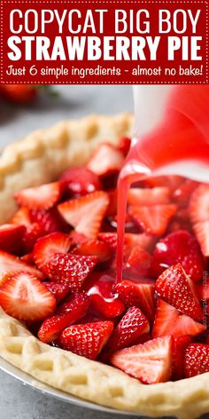 a strawberry pie being poured with red liquid