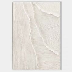 an abstract painting with white paint on the wall