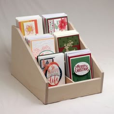 a wooden box filled with lots of cards