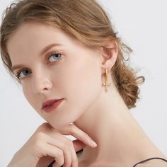 Introducing the Byzantine Faith Cross Huggie Hoop Earrings – a timeless treasure that blends the splendor of ancient art with modern sophistication. These earrings feature a classic hoop design, encrusted with shimmering stones that catch the light with every turn. From the hoops dangle exquisite crosses, each arm detailed with intricate craftsmanship and further adorned with sparkling gems, evoking the rich and opulent aesthetic of the Byzantine era. The hinged fastening ensures they sit comfor Opulent Aesthetic, Byzantine Cross, The Byzantine Empire, Cross Gift, Faith Cross, Byzantine Empire, Jewelry Knots, Hoop Design, Medallion Necklace