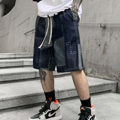 Stand out effortlessly with our elegant jean patchwork shorts. Elevate your city strolls and summer evenings with our new city shorts. This piece redefines modern urban fashion, merging vintage charm with advanced techwear aesthetics for the man who seeks to distinguish himself in the urban jungle. Imagine yourself donning these shorts, each patch showcasing visible seams that whisper tales of expert craftsmanship. This masterpiece is meticulously composed, creating a visual symphony of textures Streetwear Shorts With Multiple Pockets, Streetwear Shorts With Patch Pockets, Techwear Cotton Shorts, Summer Streetwear Patchwork Shorts, Jean Patchwork, Five-pocket Streetwear Shorts, Techwear Pants, Apocalyptic Clothing, Patchwork Shorts