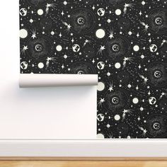 a black and white space themed wallpaper with stars