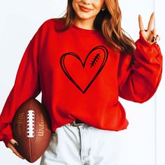 Football Heart Red Sweatshirt - Limeberry Designs Red T-shirt For Fall Game Day, Red Sweatshirt For Fan Merchandise, Fall Season, Red Sweatshirt For Sports Season Fan Merchandise, Red Sweatshirt For Sports Fan Merchandise, Red Sweatshirt For Fan Merchandise In Fall, Red Sweatshirt For Fall Fan Merchandise, Red Sporty Sweatshirt For Game Day, Sporty Red Sweatshirt For Game Day, Red Game Day Sweatshirt Fan Apparel