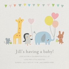 a baby shower with animals and balloons