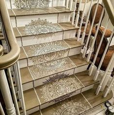 a set of stairs with decorative tiles on them