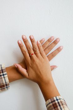 The Emilee Gold Ring Set was made to be admired and that's exactly what will happen when you head out wearing them! This set of three rings feature varying shapes and textures with rhinestones & red accents. Wear the Emilee Rings separately or stack them all together, either way you'll love them! Gold Plated Rhinestones Set of 3 Ring Sizes Vary 6.5 - 7.5 Red Minimalist Stackable Jewelry, Red Round Ring For Everyday, Everyday Red Round Ring, Red Minimalist Promise Ring, Minimalist Red Promise Ring, Minimalist Red Open Ring, Red Stackable Open Ring, Minimalist Red Stackable Rings, Everyday Minimalist Red Rings