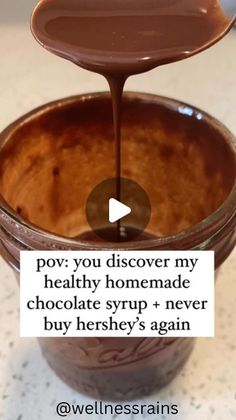 chocolate syrup being poured into a bowl with the words pov you discovery my healthy homemade chocolate syrup + never buy hershey's again