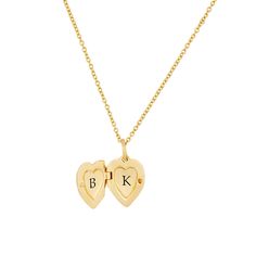 Our new Heart Mini Locket Necklace is a dainty way to celebrate the love in your life! This tiny, yet meaningful necklace opens with space inside for two initials - perfect for you and your partner as a reminder that it all started with you falling in love. Or, engrave any two initials that are special to you! available in gold vermeil, sterling silver and 14k yellow gold locket can be engraved inside with one initial per side (uppercase only) hangs on adjustable cable chain locket measures 12 x Chain Locket, Tiny Tags, Gold Locket Necklace, Meaningful Necklace, Sterling Silver Locket, Engraved Initials, New Heart, Gold Locket, Meaningful Jewelry