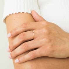 Make your jewelry part of your workout with our Tiny Opal Ring. It's strong enough to stand up to all the sweat while looking beautiful and feminine! Opal is also October's birthstone, so this makes the perfect gift for the October baby in your life! We love it stacked with our Braided Stacking Ring or Simple Stacking Ring. DETAILS 14k gold filled ring 1mm band with 2mm synthetic opal Available in sizes 5-8 Safe for sensitive skin & shower safe Matching jewelry: Tiny Opal Necklace, Tiny Opal Stu Dainty Opal Ring, Simple Stacking Rings, Gold Opal Ring, October Baby, Dainty Initial Necklace, Knuckle Ring, Opal Ring Gold, Ball Chain Necklace, Opal Earrings Stud