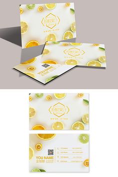 two business cards with orange slices on them