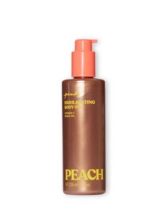 HIGHLIGHTING PEACH BODY OIL VITAMIN C PEACH OIL Get glowing. A deliciously-peachy spin on our shimmer body oil. This lightweight body oil is packed with skin-brightening Vitamin C, Peach Kernel Oil, and gorgeous gold shimmer. Lightweight and transfer-proof, it leaves your skin with a gleaming, sun-kissed sheen, and deliciously peachy scent. Time to shine. Shimmer intensity: Medium 8 oz. FORMULATED WITHOUT PHTHALATES, SULFATES, PARABENS, OR ARTIFICIAL DYES VEGAN AGAINST ANIMAL TESTING DERMATOLOGI Best Smelling Body Oil, Bronze Body Oil, Peach Body Care, Luxury Body Oil, Shimmering Body Oil, Body Glow, Shimmer Body Oil, Artificial Dyes, Shower Skin Care