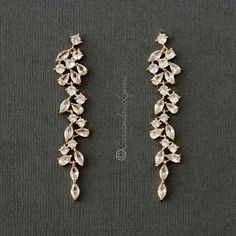 two pairs of gold and crystal earrings