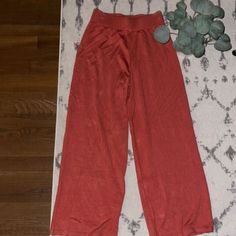 These Rust Colored Woven Pants Feature An Elastic Waistband And Straight Legs. Whether She Goes For A Monochromatic Look Or Pairs Them With Some Neutrals, She'll Be Sure To Look (And Feel) Amazing. This Item Is Unworn And Nwt. Red Stretch Full-length Sweatpants, Red Stretch Full Length Sweatpants, Red Elastic Waistband Sweatpants For Fall, Red Sweatpants With Elastic Waistband For Fall, Red Relaxed Fit Bottoms For Loungewear, Red Sweatpants With Elastic Waistband For Spring, Red Cotton Pants For Loungewear, Red Loungewear Bottoms With Elastic Waistband, Red Lounge Bottoms With Elastic Waistband