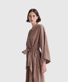 Deiji Studio’s timeless loungewear is inspired by Japanese culture and designed to be worn in bed, at home or out and about. Made from French flax, the naturally hypoallergenic linen of this kimono-style robe is stonewashed for added softness and minimal shrinkage. The relaxed silhouette has dropped shoulder seams, wide sleeves, on-seam side pockets and a linen sash belt. One size fits most. Available in four colors – Natural, Black, Vintage Blue or Clove. Long Sleeve Linen Kimono For Loungewear, Relaxed Fit Linen Sleep Robe, Relaxed Fit Linen Robe For Loungewear, Linen Kimono With Relaxed Fit, Beige Linen Kimono For Loungewear, Spring Linen Loungewear Robe, Summer Linen Lounging Robe, Oversized Linen Robe For Loungewear, Beige Relaxed Fit Kimono For Loungewear