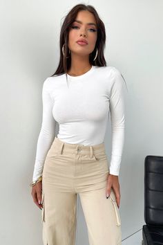 Oh baby, she's a basic you need! Elevate your everyday wardrobe with the Lemar long sleeve, offering a super soft, stretchy material, long sleeves, a round neckline and a THATSSOFETCH logo across the back. Style her with basic denim jeans and sandals for a casual stroll around the city.
FABRICATION:

95% Polyester / 5% Elastane
SIZING:
Crystal's height is 162cm and wears a size AU6/US2 Trendy Long Sleeve Crew Neck Top With Thumbholes, Basic Long Sleeve Top For Fall, Stretch Long Sleeve T-shirt For Everyday, Everyday Stretch Long Sleeve T-shirt, White Stretch Long Sleeve Top For Everyday, Basic Long Sleeve Tops With Thumbholes, Simple Long Sleeve Tops For Everyday, Basic Long Sleeve Top For Everyday, Basic Long Sleeve Top For Layering