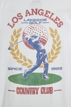 the los angeles golf country club t - shirt is white with blue and yellow graphics