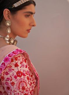 Features a blush pink raw silk lehenga set embroidered with traditional zardozi technique using resham work, dabka, cutdana and sequins and featuring a scallop border. Completed with two dupattas in pink and white hues with an embroidered resham border. Composition : Lehenga and Blouse - Raw Silk, Dupatta- Net Care: Dry Clean Only and Vacuum Storage This product can be customised for sleeves, length of blouse and neckline Delivery : 6-8 weeks as the product is hand crafted. Check Size Guide or c Pink Chandbali Choli With Intricate Embroidery, Pink Traditional Wear With Resham Embroidery, Pink Raw Silk Traditional Wear With Resham Embroidery, Pink Raw Silk Fabric With Zari Embroidery, Pink Traditional Wear With Resham Embroidery For Navratri, Pink Kundan Dupatta With Intricate Embroidery, Pink Dori Work Chandbali Saree, Pink Saree With Dori Work For Reception, Pink Raw Silk Anarkali Set With Resham Embroidery