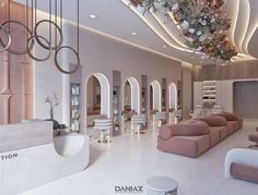 the interior of a salon with pink and white furniture