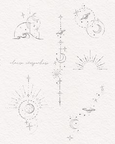 some drawings on paper that have been drawn in different styles and sizes, including stars