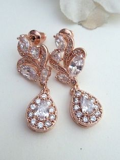 Bridal Wedding Earrings Rose Gold Clear White by JCBridalJewelry Rose Gold Cubic Zirconia Teardrop Earrings For Party, Rose Gold Teardrop Cubic Zirconia Earrings, Elegant Rose Gold Teardrop Earrings With Cubic Zirconia, Rose Gold Cubic Zirconia Teardrop Earrings, Rose Gold Drop Bridal Earrings For Anniversary, Rose Gold Cubic Zirconia Drop Bridal Earrings, Rose Gold Cubic Zirconia Teardrop Earrings For Gift, Rose Gold Teardrop Pear-shaped Earrings For Anniversary, Rose Gold Teardrop Earrings For Anniversary