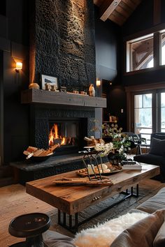 a living room filled with furniture and a fire place in the middle of the room