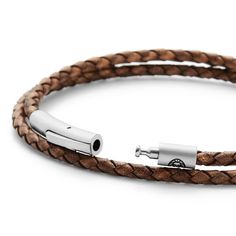 a brown leather bracelet with silver clasps