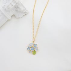 🎉Dainty enamel blooming hydrangea pendant necklace 🎉Design and handcraft in our Burlington Studio ------------------------------------------------------------- PRODUCTS DETAILS Pendant: 17X14mm Pendant: 14K gold plated enamel Chain: 14K gold filled Chain length: 16"/18"/20"/22" available from drop-down list, other length pls leave me a message for customization Model: 18" chain ------------------------------------------------------------- SAME COLLECTION Earrings https://www.etsy.com/ca/listing/1609514998/dainty-blooming-hydrangea-earrings?click_key=8637ce1f0057139e098215ee2c28a228be49833d%3A1609514998&click_sum=1e725628&ref=shop_home_active_1&frs=1&sts=1 ------------------------------------------------------------- PACKAGE Gift packed: Jewelry box + bow + cleaning cloth + personalized m Dainty Flower-shaped Enamel Jewelry, Flower Shaped Enamel Jewelry For Wedding, Flower-shaped Enamel Jewelry For Wedding, Enamel Flower-shaped Jewelry For Wedding, Flower Shaped Enamel Wedding Jewelry, Enamel Flower Shaped Wedding Jewelry, Floral Enamel Wedding Jewelry, Gold Enamel Necklace For Wedding, Wedding Pendant Necklace In Enamel