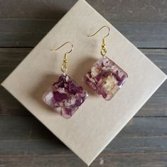 Beautiful Handmade Resin Earrings With Square Resin Pendants Filled With Real Dried Rose Petals, And Vibrant Yellow Wildflower. Natural Flower Earrings, Comfortably Lightweight, And Filled With Natural Beauty Preserved For Eternal Elegance Rose Petal Resin Keychain, Uv Resin Flower Jewelry, Pink Flower Crystal Earrings For Gift, Pink Flower Earrings Gift For Her, Flower Shaped Crystal Earrings With Flower Charm For Gifts, Flower-shaped Crystal Earrings With Flower Charm As Gift, Flower-shaped Crystal Earrings With Flower Charm, Flower Shaped Crystal Earrings With Flower Charm, Pink Drop Flower Earrings As Gift For Her