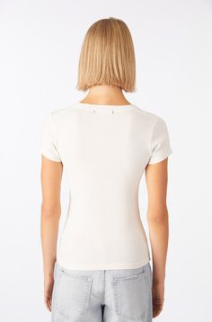 The tee, perfected. All the details are taken care of, from the curve of the neckline and the soft 1x1 rib, to the short sleeves that fall in the right spot. But our favorite has to be the throwback shoulder seam. COLOR: EGGSHELL FIT & MEASUREMENTS: Length = 23 3/4" Chest = 13 1/2" Measurements taken from size Small Anaiis is wearing size S and is 5'11" FABRIC & CARE: 100% Cotton Machine Wash Cold. Made with love in Los Angeles Penny Tees, Egg Shells, Cotton Poplin, The Details, Fabric Care, Jumpsuit Dress, Wide Leg Pants, Penny, Sweater Top