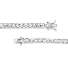 Wrap your wrist in timeless style and sparkle when you wear this white lab-created sapphire tennis bracelet in silver. Fashioned in sterling silver 4.0mm white lab-created sapphires shimmer in a continuous row for a classic look. This 7.25-inch bracelet secures with a box clasp. Classic Sterling Silver Bracelet With Sparkling Stones, White Sterling Silver Tennis Bracelet For Anniversary, White Bracelet With Diamond Accents, Classic Silver Cubic Zirconia Tennis Bracelet, Classic Sterling Silver Tennis Bracelet With Sparkling Stones, Dazzling White Sterling Silver Tennis Bracelet, Timeless White Sterling Silver Bracelet With Diamond Accents, Classic Bracelets With Sparkling Stones, White Cubic Zirconia Sterling Silver Bracelet