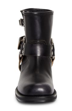 Roller buckles and rivets bring moto swagger to this square-toe harness boot crafted from smooth, polished leather in an ankle-high silhouette. 1 3/4" (44mm) heel 5 1/2" shaft Pull-on style with adjustable straps Leather upper and lining/rubber sole Made in Italy Designer Shoes Edgy Leather Moto Boots With Snip Toe, Fall Calf Leather Moto Boots With Buckle, Edgy Leather Boots With Metal Pin Buckle, Classic Calf Leather Moto Boots With Buckle, Punk Boots With Buckle Closure For Biker Events, Miu Miu Leather Boots With Round Toe, Miu Miu Leather Boots Round Toe, Classic Ankle Moto Boots With Buckle, Leather Moto Boots With Buckle And Square Toe