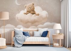 a teddy bear sitting on top of a cloud in the sky with stars and moon behind it