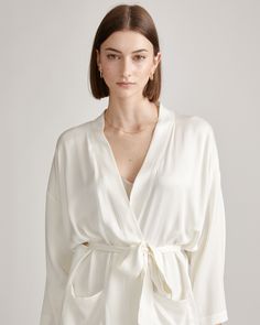 Now available in a range of sizes, our dreamy silk robe is the key to living your best life ever. Made from 100% mulberry silk that's easily washable, this is low-maintenance luxe at its finest. And there's a beauty bonus: Silk fiber contains 18 kinds of amino acids that make it amazing for skin nourishment. It's also hypo-allergenic and naturally thermoregulating to keep you comfy whenever you slip it on.  | Quince | Women's Robe in Ivory, Size XL, Mulberry Silk Silk V-neck Kimono For Daywear, Silk V-neck Robe For Loungewear, Elegant Silk Sleepwear For Relaxation, Elegant Wrap Robe For Relaxation, Elegant V-neck Kimono For Daywear, Elegant Silk Kimono For Sleep, Elegant Silk Summer Robe, Elegant Summer Silk Robe, Chic Silk Robe For Sleeping