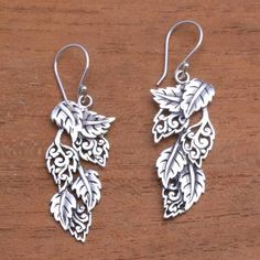 Leaf-Themed Sterling Silver Dangle Earrings from Bali - Fantastic Forest | NOVICA Forest Leaves, Wax Carving, Silver Dangle Earrings, Dragon Pendant, Silver Work, Sterling Silver Dangle Earrings, Sterling Silver Hoop Earrings, Sterling Silver Hoops, Balinese