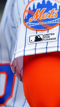 the new york mets baseball team's uniform is displayed in this close up photo