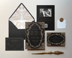 an assortment of black and gold wedding stationery